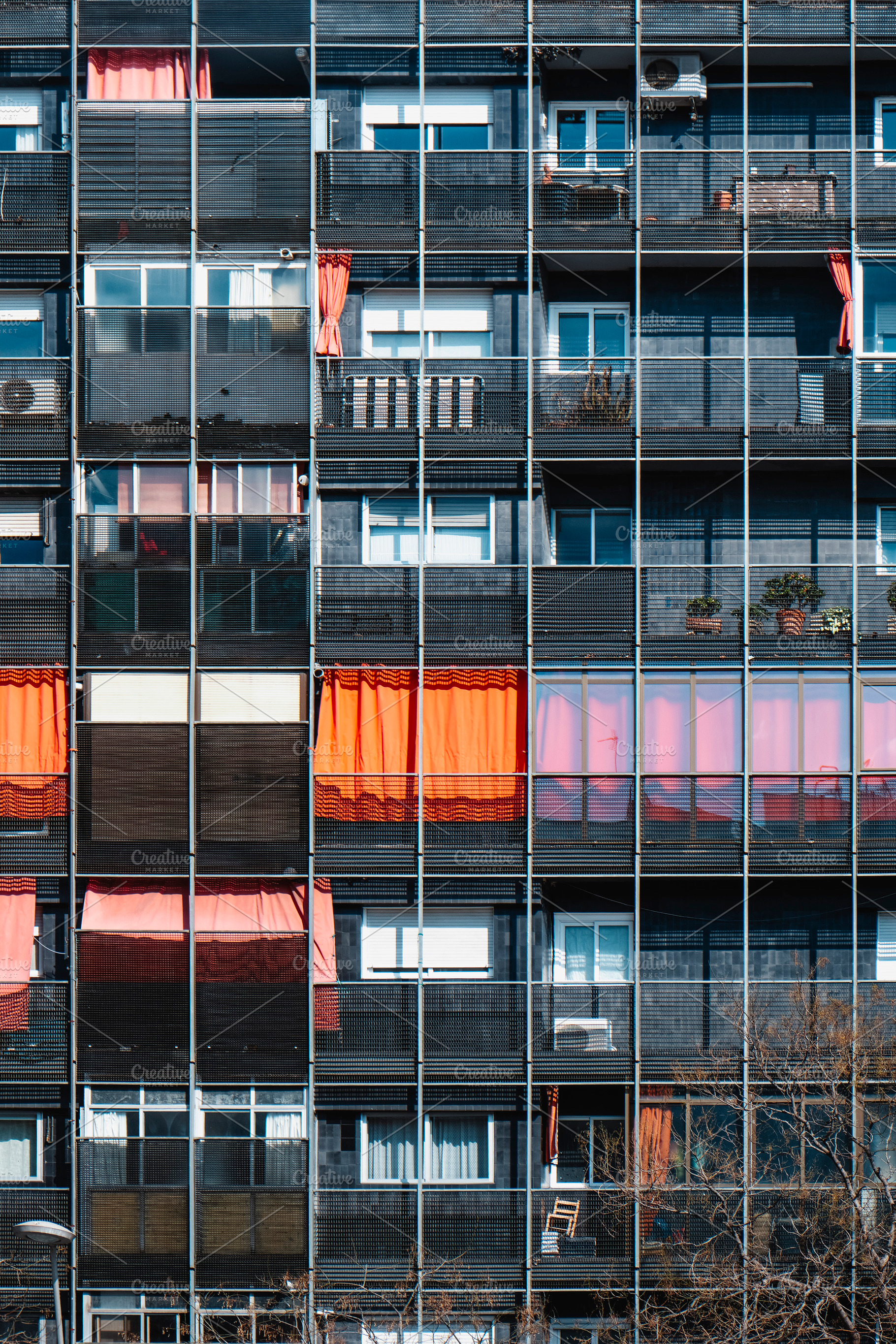 detail of a modern apartment building, a Photo by Nito