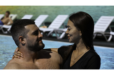 Portrait of loving couple having fun, a Person Photo by Media Whale Stock