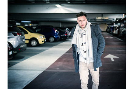 Handsome standing in indoor parking, a Person Photo by ArtOfPhotos photo store
