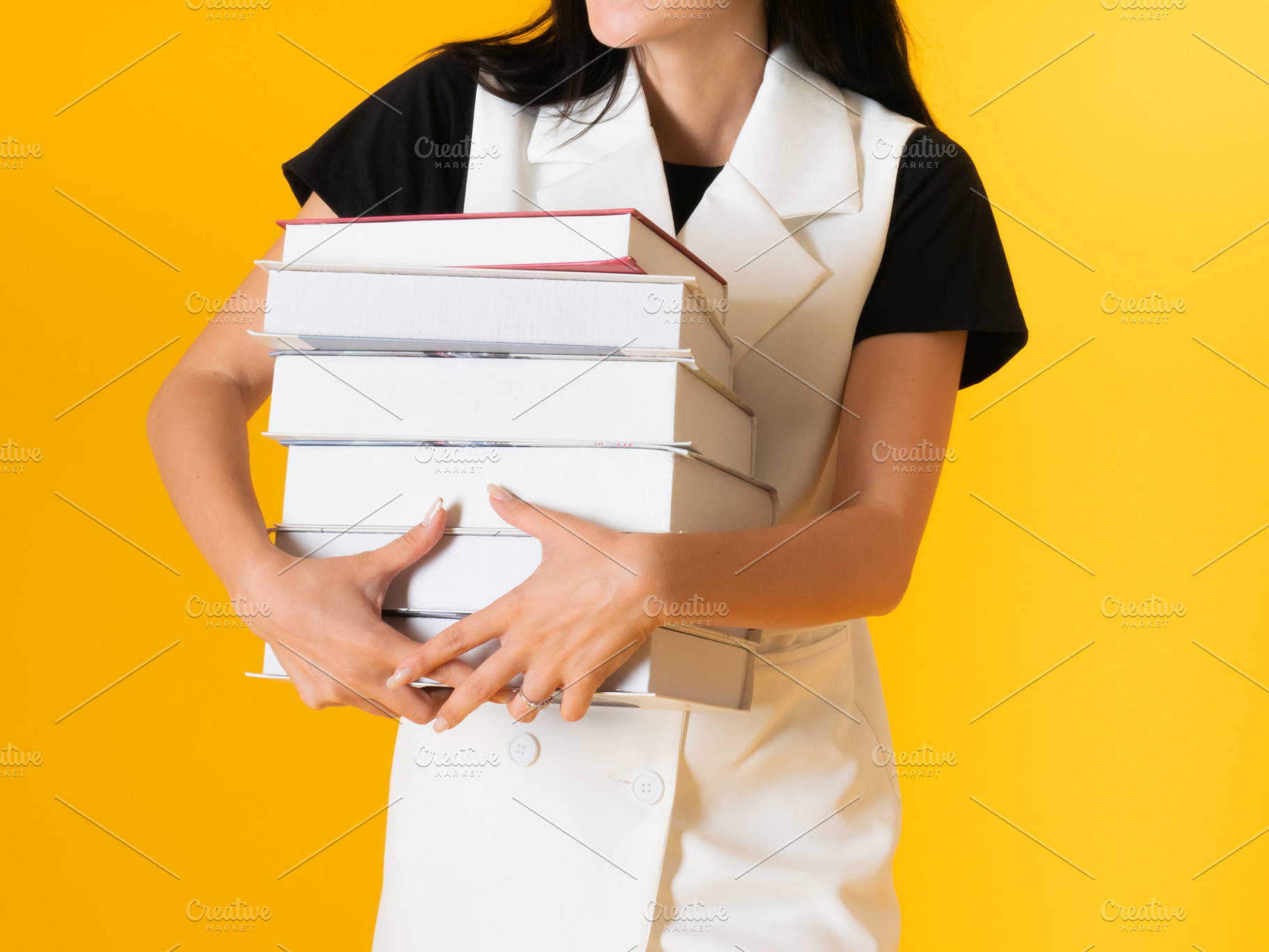 Woman Holding Hardcover Book, a School & Education Photo by MergeIdea