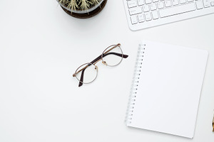 Flat lay composition with copy space. Mock up notebook. Office workspace and pr, a Photo by matucha