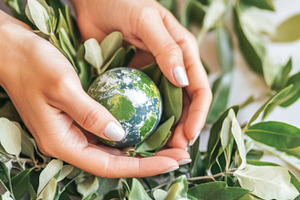 Earth Day concept with hands holding, a Photo by Dvoevnore photos