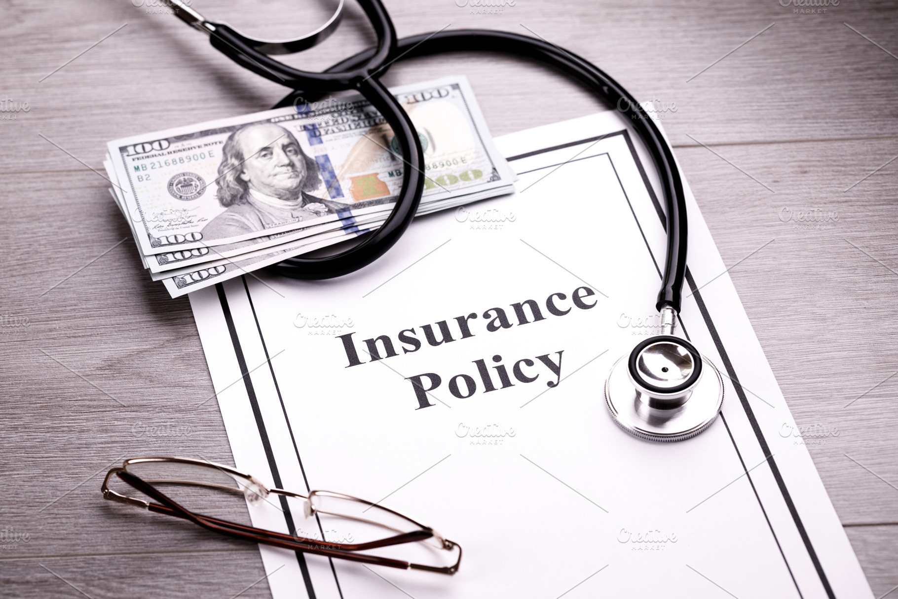 Health insurance policy stethoscope, a Health & Medical Photo by FineArtStudio