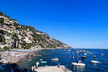 Scenic coastal view of Mediterranean beach with clear blue sky. Positano, Italy, a Photo by AS photostudio
