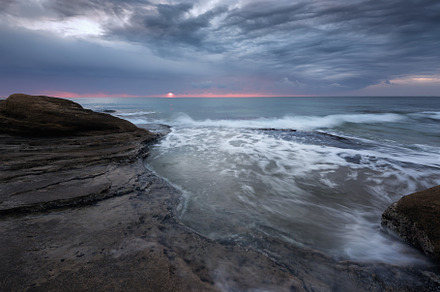 Seascape during sunrise featuring sunrise, sea, and sky