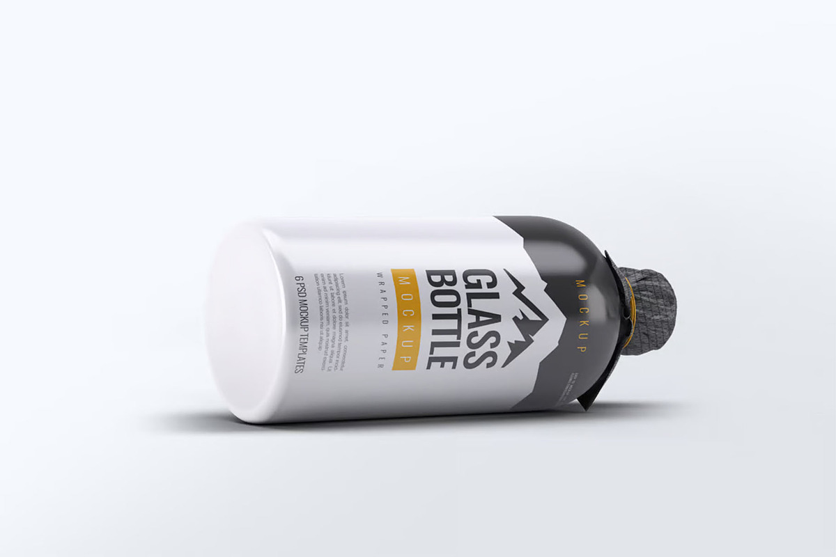 Glass Bottle Wrapped Paper Mock-Up, a Product Mockup by DesignRushMarket (Photo 4 of 7)