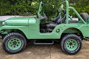 Jeep parked at street, punta del este city, uruguay, a Transportation Photo by DanFLCreativo