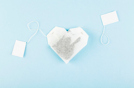 Tea bags in form of heart on blue ba stock photo containing tea and bag, a Food & Drink Photo by matucha
