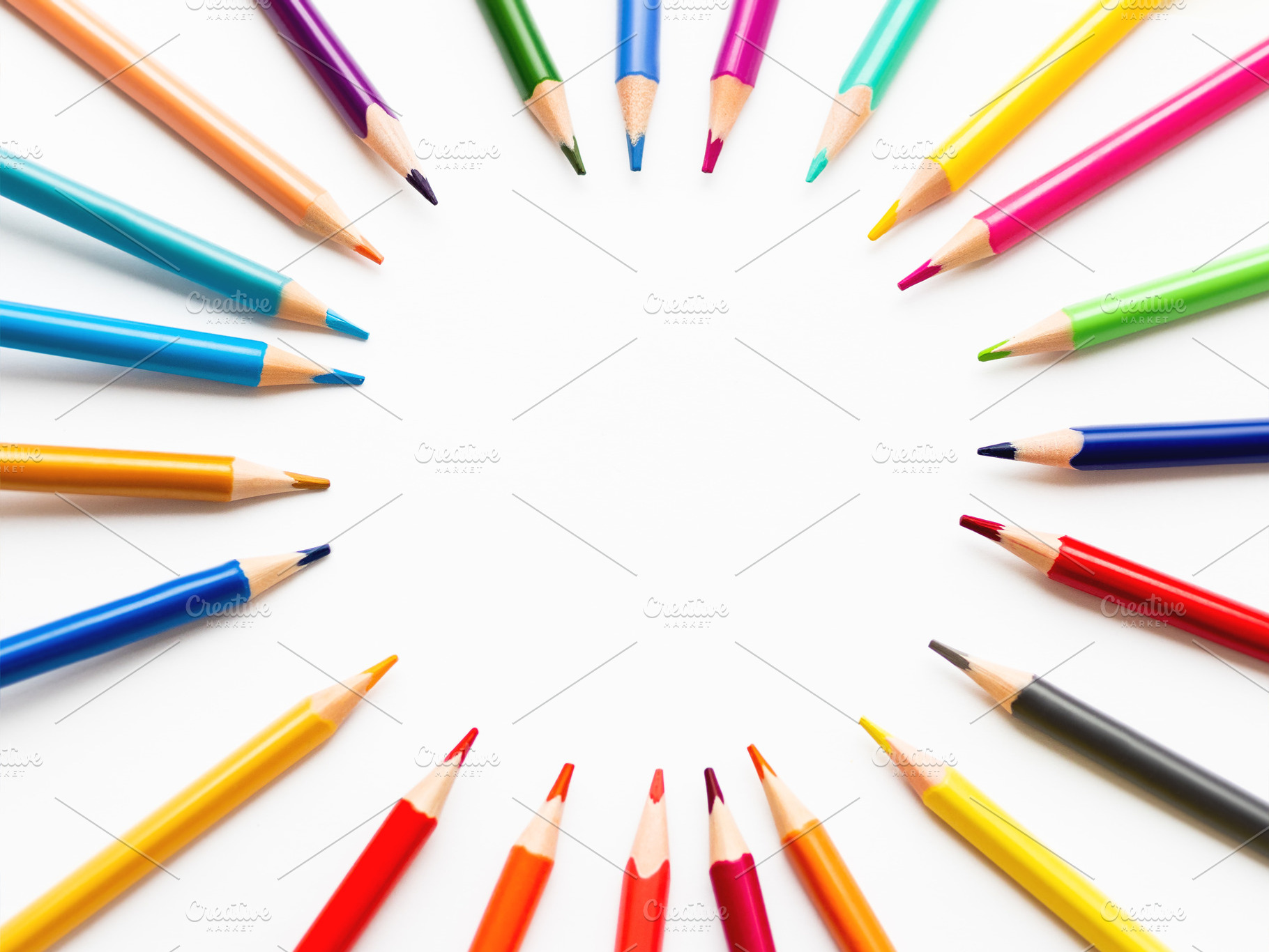 Colorful pencils circle copy space containing pencil, stationery, and crayon, a School & Education Photo by Aksenov_K