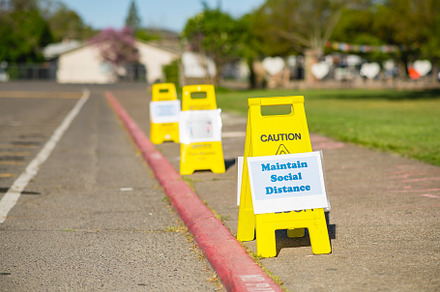 Coronavirus social distance signage containing pandemic, social distancing