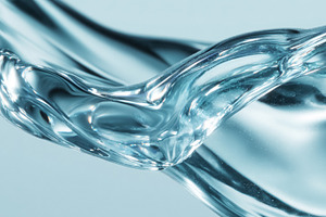 Flowing clear water liquid creating abstract forms, reflecting l, a Photo by Studio ANNA