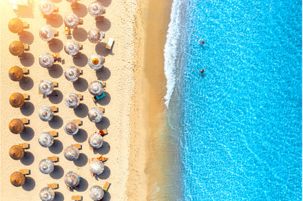 Aerial view of colorful umbrellas on, a Nature Photo by den-belitsky