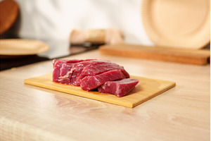 A piece of fresh beef is placed on a, a Food & Drink Photo by darksoul72
