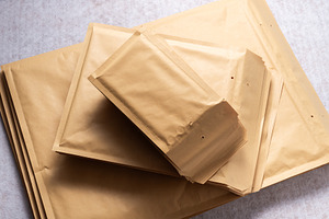 Set of Bubble Mailer Plastic Padded Envelopes in Different Sizes, a Business Photo by MDBildes