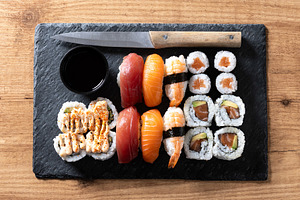 Assorted sushi platter with nigiri and rolls, a Food & Drink Photo by etorres69