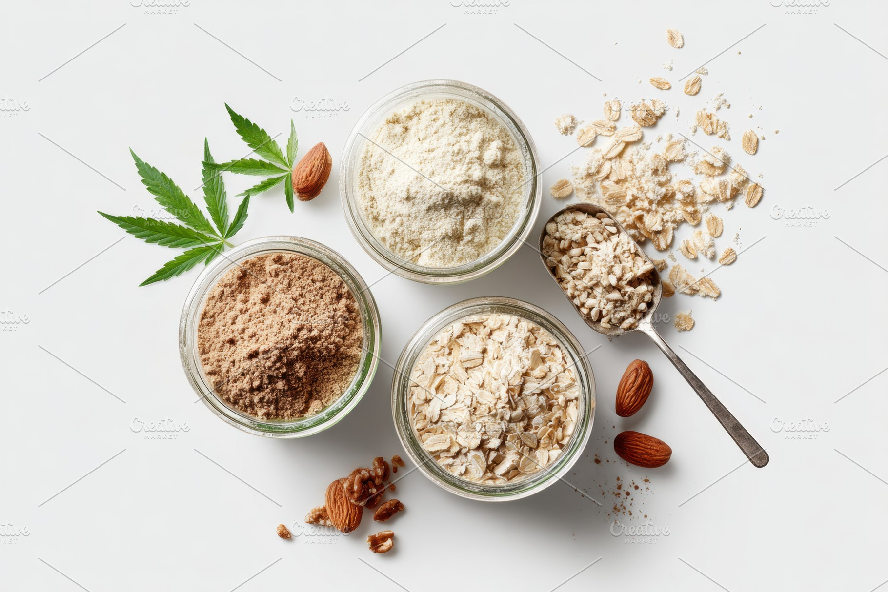 Various flours and oats with cannabis leaf and almonds, a Food & Drink Photo by AlyaAnd