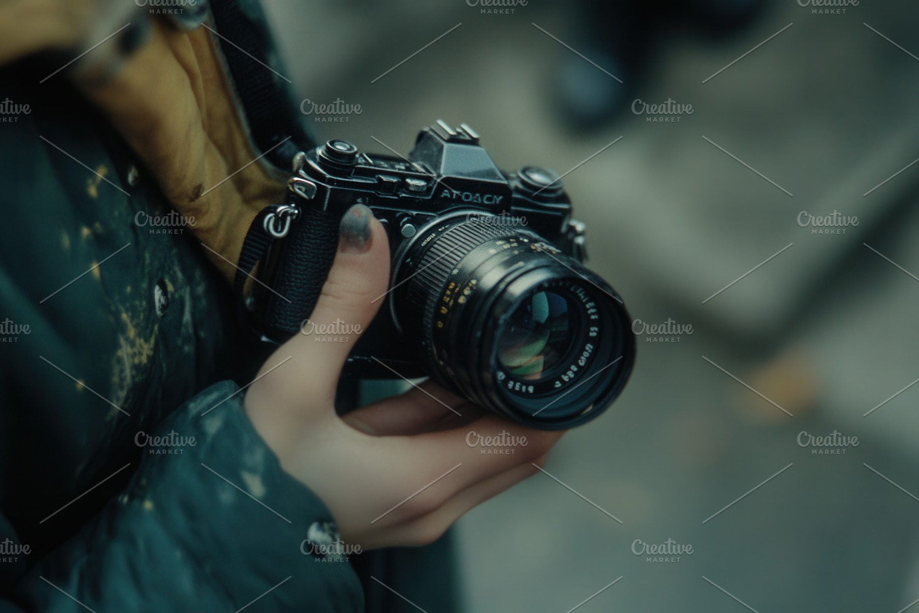 Photographer holding a camera, a Photo by Pavel_design