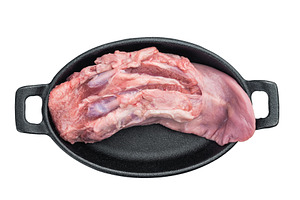Raw pork tongue placed in cast iron pan on white background fres, a Food & Drink Photo by composter-box@mail.ru