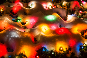 Christmas lights under the snow