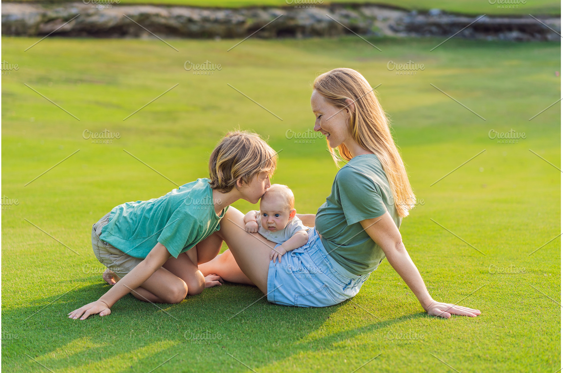 Mother, older son, and newborn baby, a Nature Photo by Elizaveta Galitskaya
