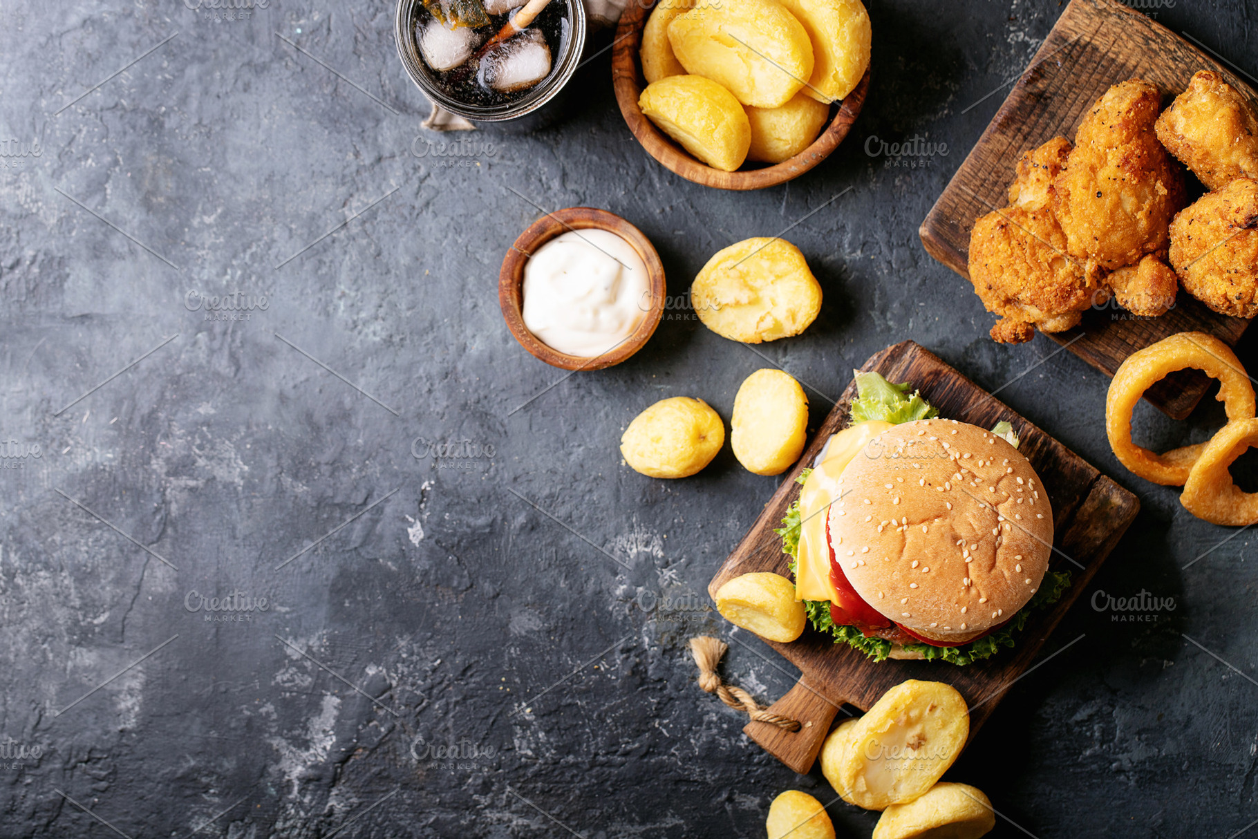 Home made burgers with onion rings stock photo containing burger and bun, a Food & Drink Photo by RomanDebree