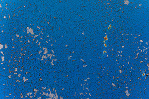 Close-up of weathered blue surface with extensive cracking and p, a Background Photo by Ales Munt