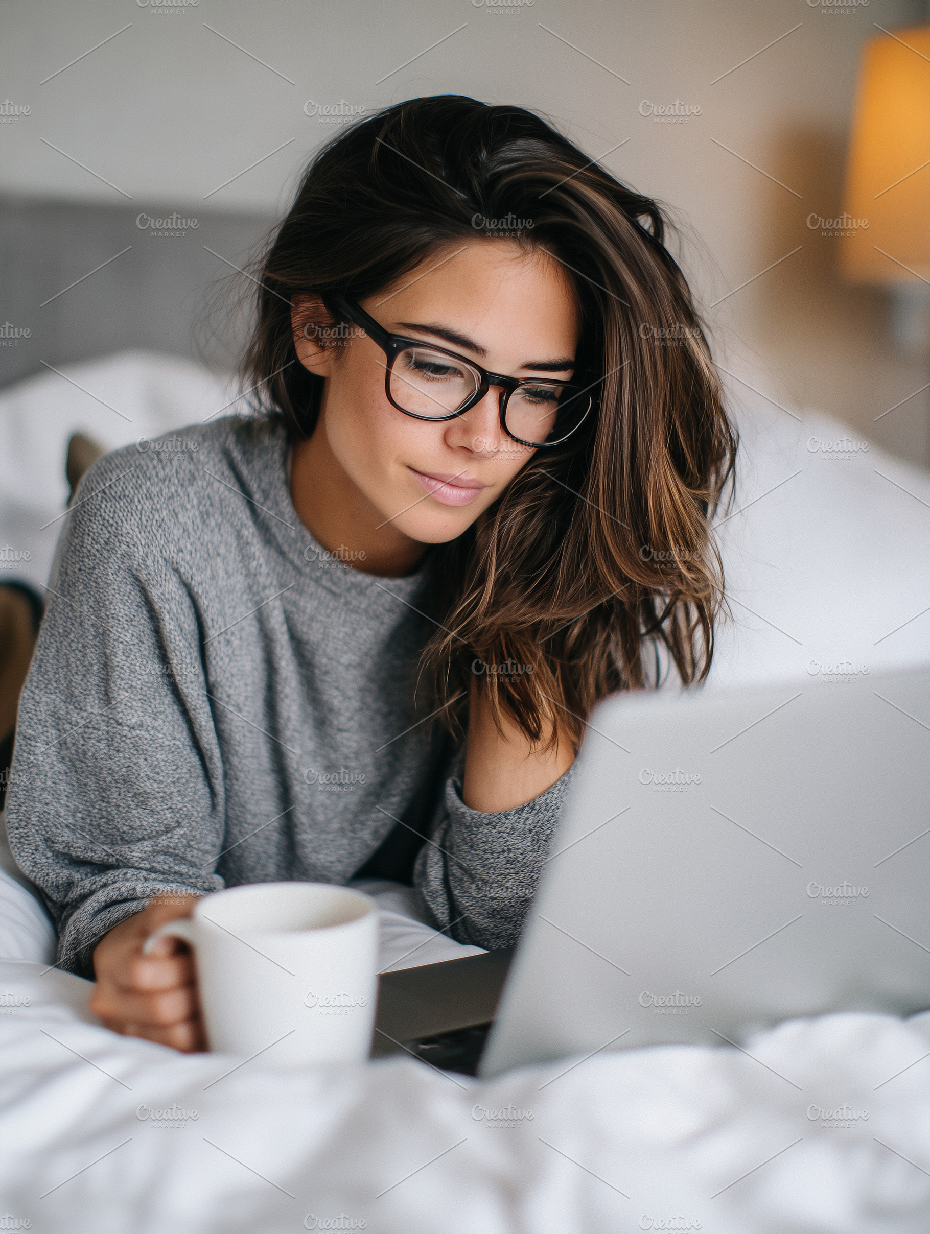 Young woman with glasses use laptop, a Person Photo by MistyDay