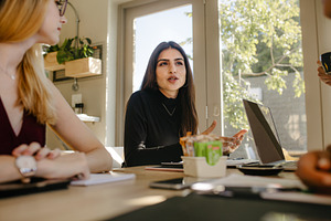 Businesswoman talking featuring brainstorming, business, and businesswoman, a Business Photo by Jacob Lund