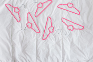 Set of pink velvet clothes hangers, a Beauty & Fashion Photo by Kolomiyets Viktoriya