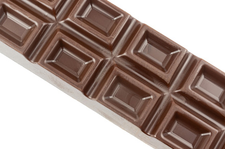 Chocolate bar isolated on white back, a Food & Drink Photo by AlexBush