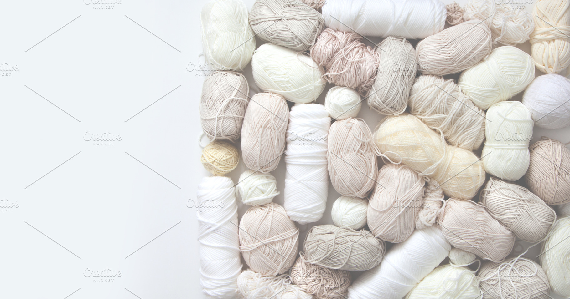 White, light, neutral yarn for knitting. Top view., a Holiday Photo by Natalia Kostikova