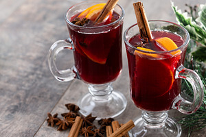 Mulled Wine with Orange and Cinnamon Sticks and Christmas decoration, a Food & Drink Photo by etorres69