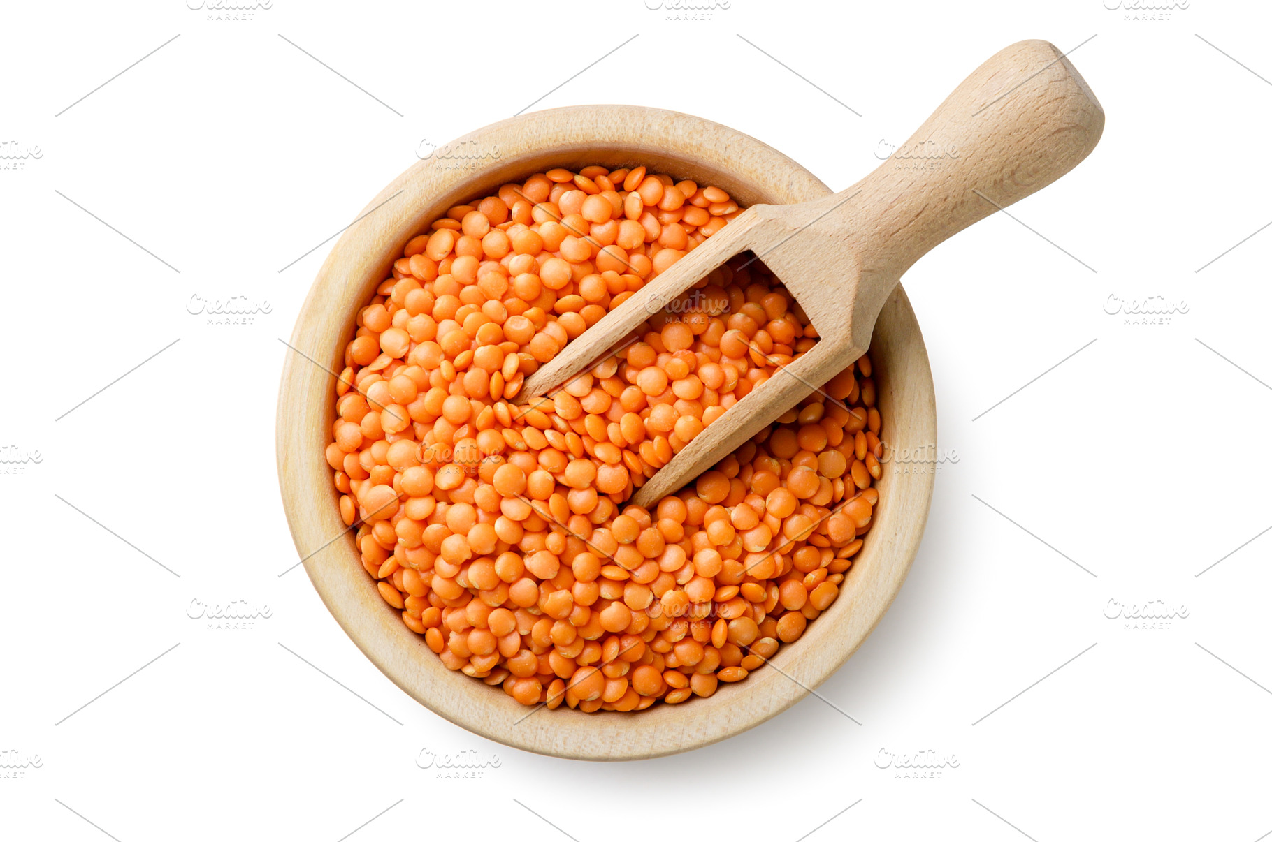 Red lentils in a wooden plate with a, a Food & Drink Photo by innakreativ