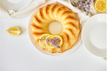 Top view of lemon cake on white, a Food & Drink Photo by IlliaBondarPhotography