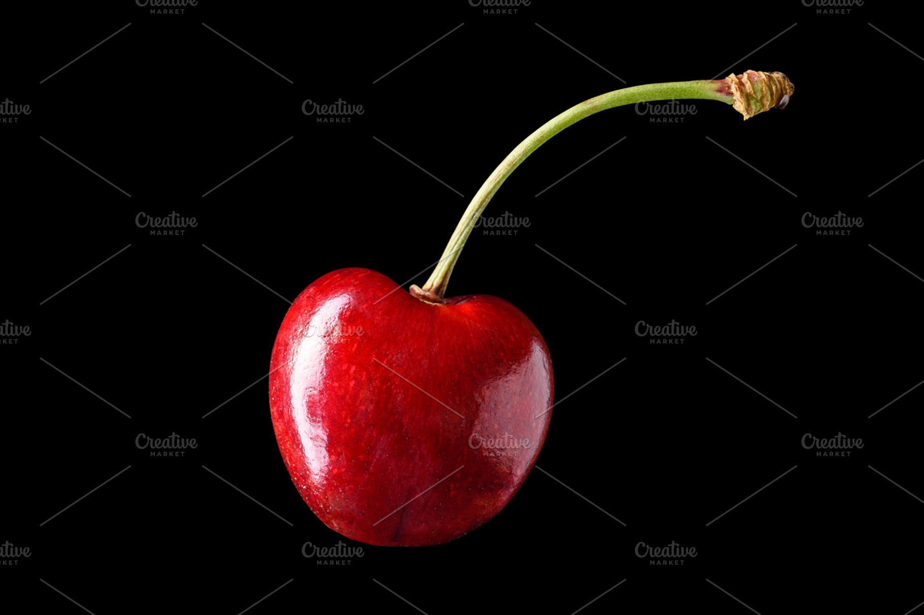 Isolated sweet merry cherry over black background, a Food & Drink Photo by Edgieus