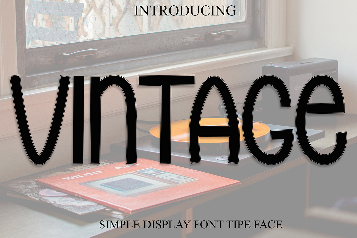 Vintage, a Script Font by InermediaSTUDIO (Photo 1 of 8)