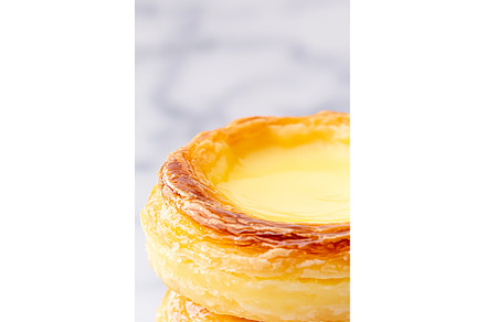 Golden crispy pastel de nata with, a Food & Drink Photo by Lermont51