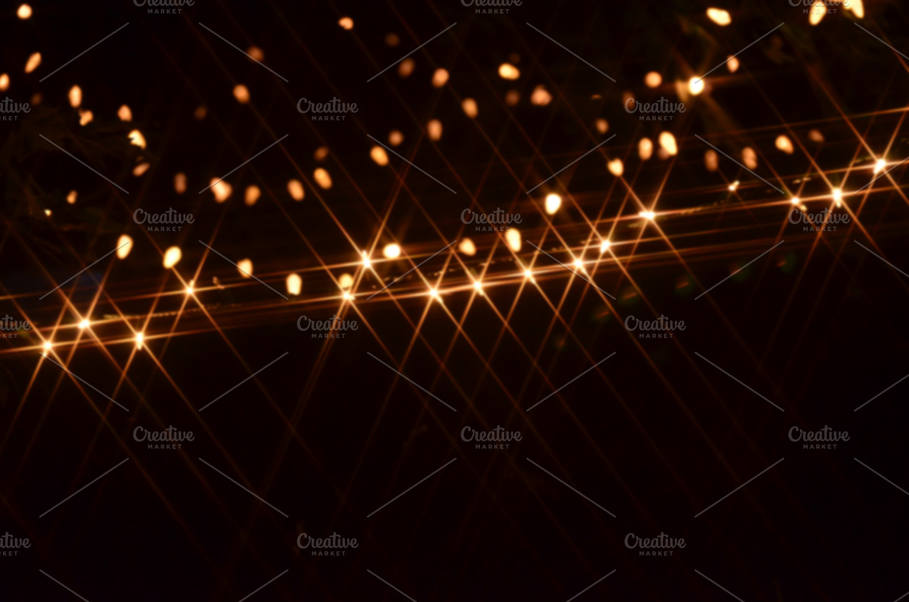 Hanging Lights Bokeh, an Abstract Photo by Vanilla Extinction