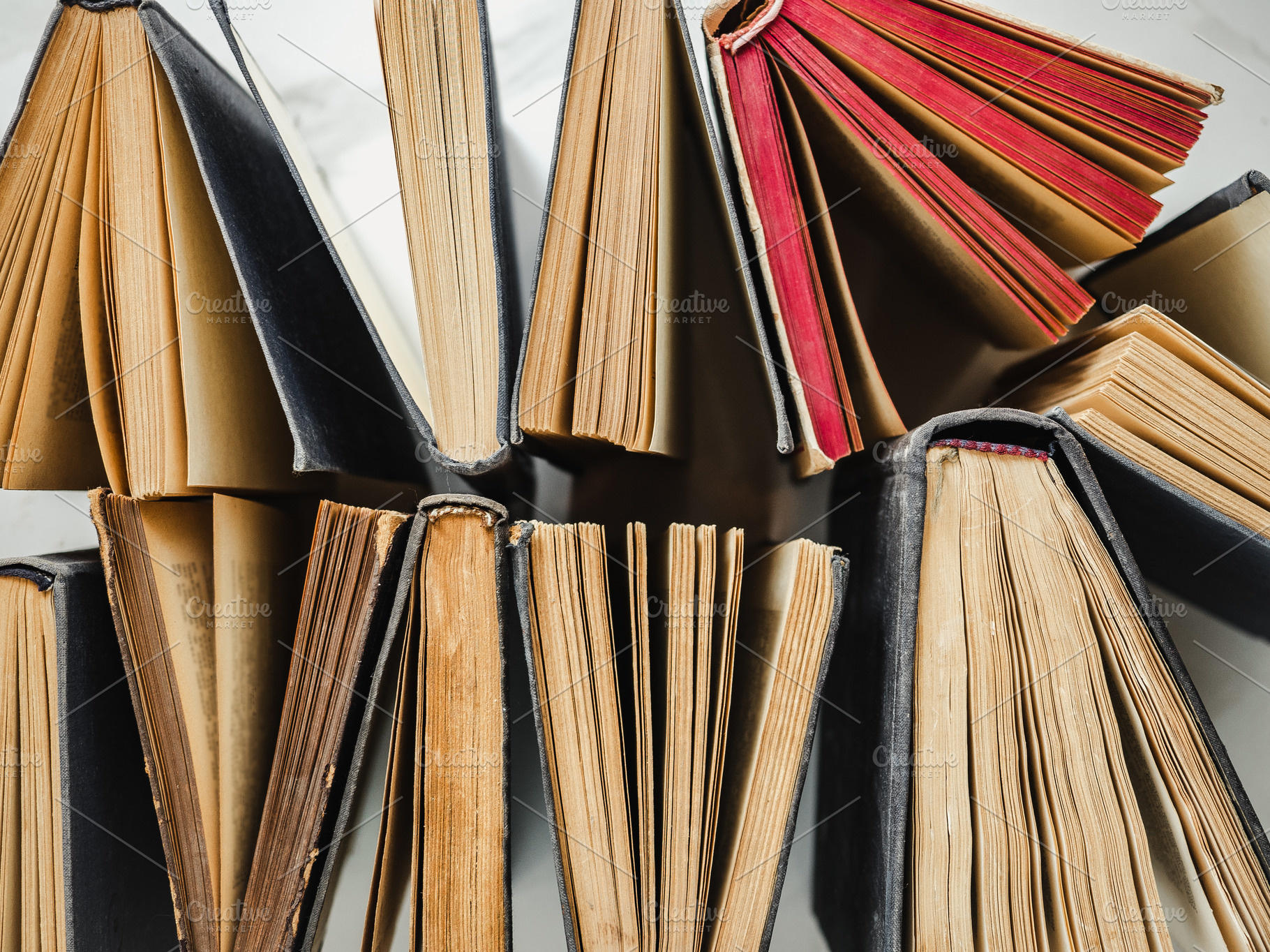 Stack of vintage books lying on the table, a School & Education Photo by Svetlana Barchan