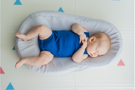 Chubby 3-month-old baby peacefully