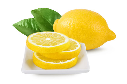 Ripe lemon slices in ceramic bowl, a Food & Drink Photo by NataPhoto