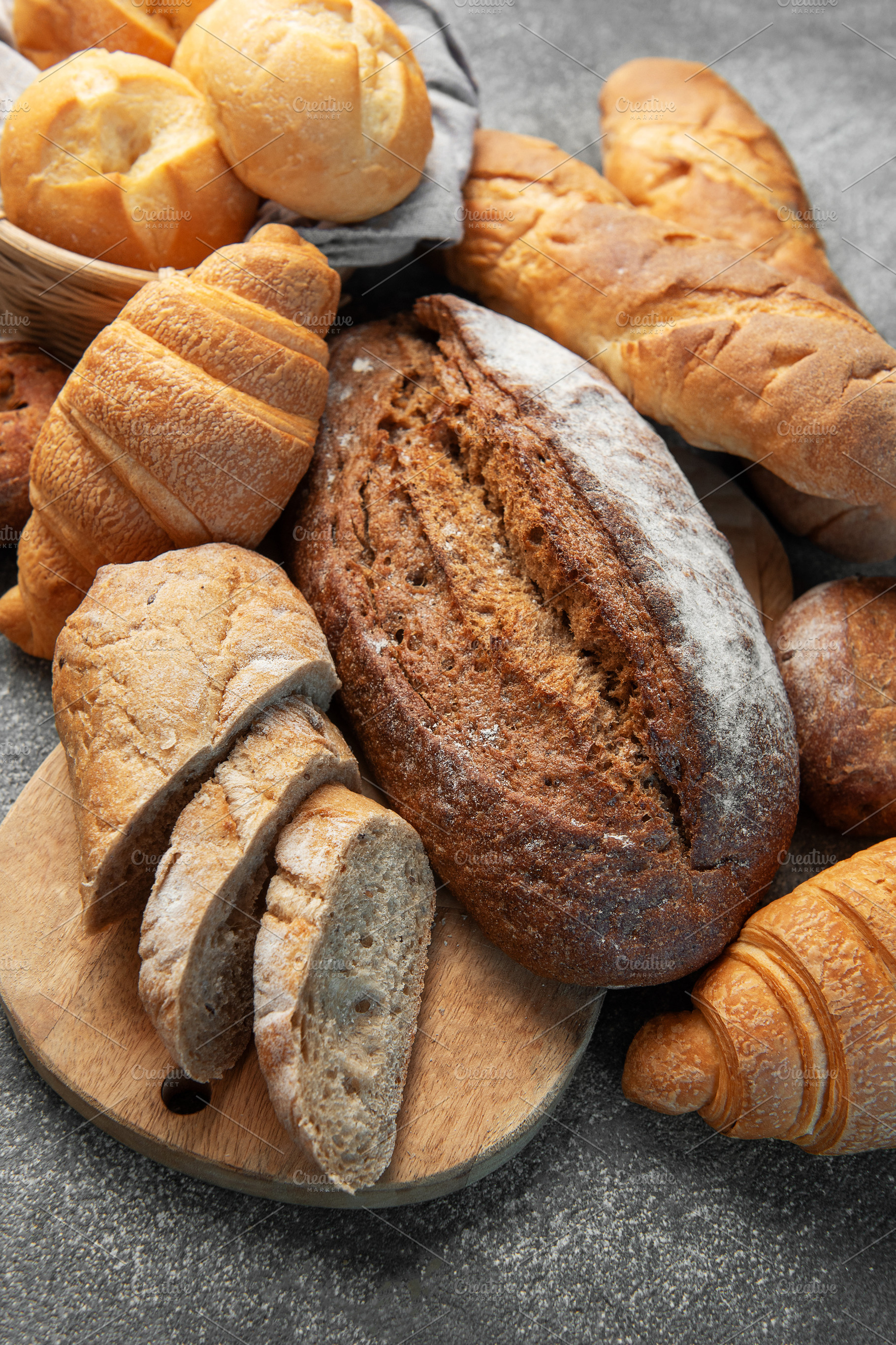 Freshly baked bread and pastries assortment for breakfast, a Food & Drink Photo by Olena Rudo