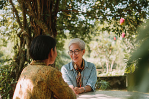 Friends laugh in the garden, a Photo by Beautiful things