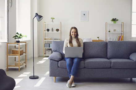 Young beautiful girl uses a laptop, a Person Photo by StudioRomantic