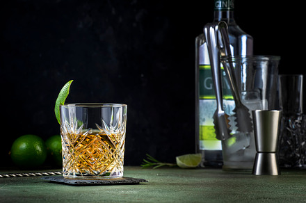 White negroni cocktail with dry gin, white vermouth and herbal a, a Food & Drink Photo by 5PH