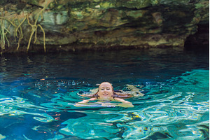 Female tourist enjoying a refreshing, a Nature Photo by Elizaveta Galitskaya