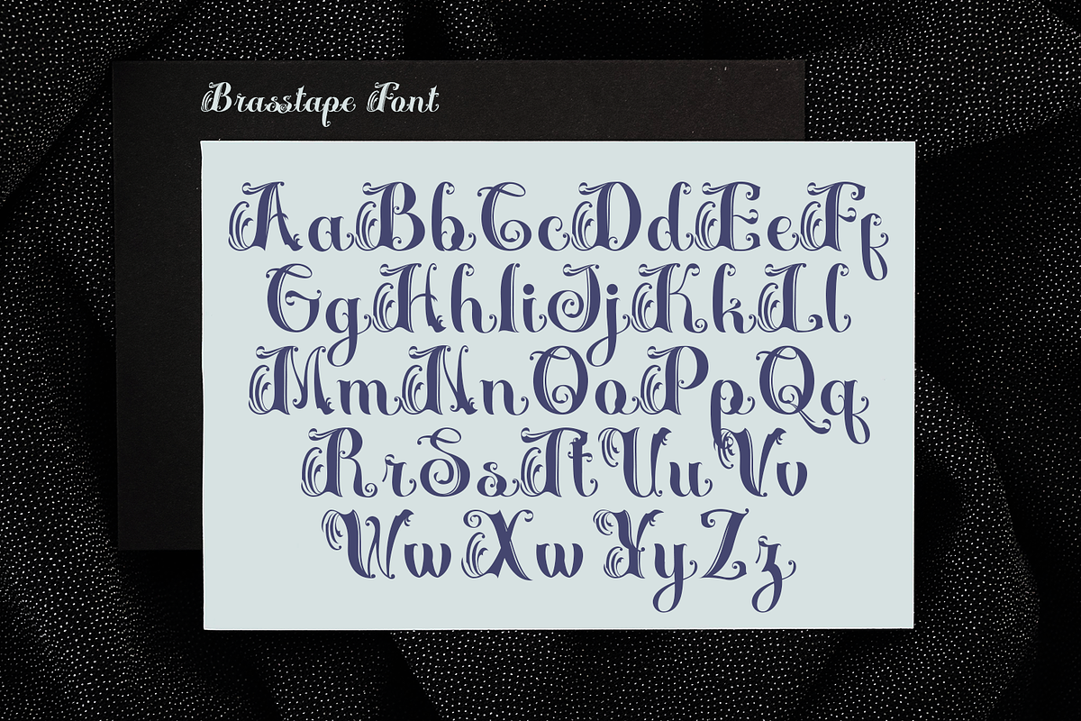 Brasstape Decorative Script, a Blackletter Font by madeDeduk (Photo 4 of 10)