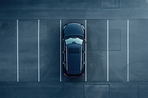 Aerial view of car parked in the parking lot, a Transportation Photo by AlyaAnd