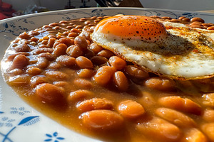 Baked beans served with a fried egg, a Food & Drink Photo by 1miromiro