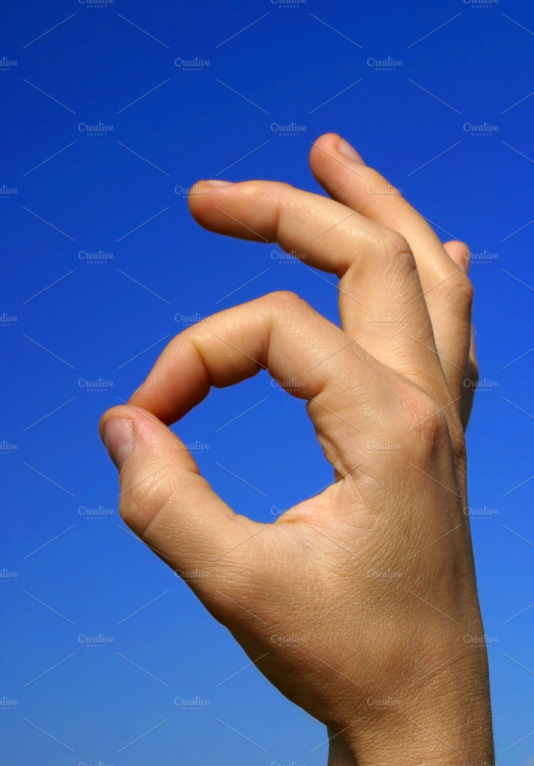 Ok sign, a Photo by saiko3p
